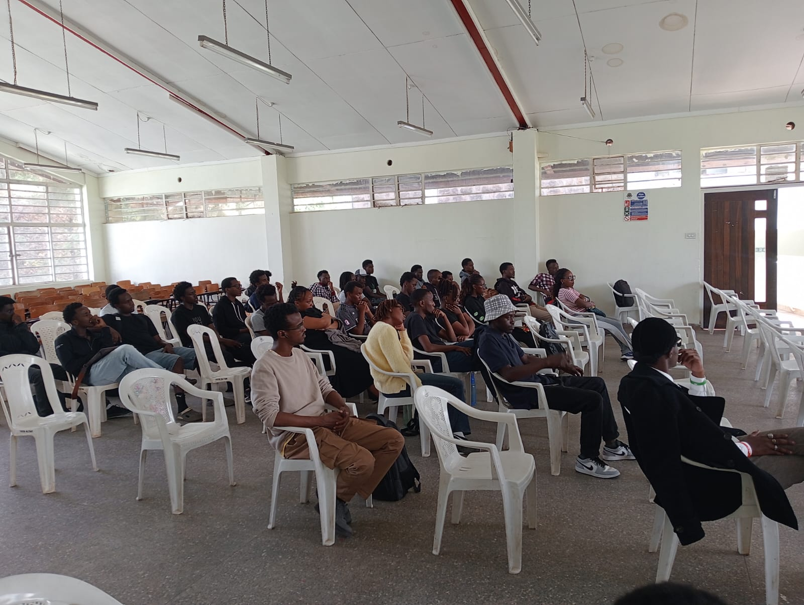 Students seated at the Assembly Hall during the AWS Cloud Day session