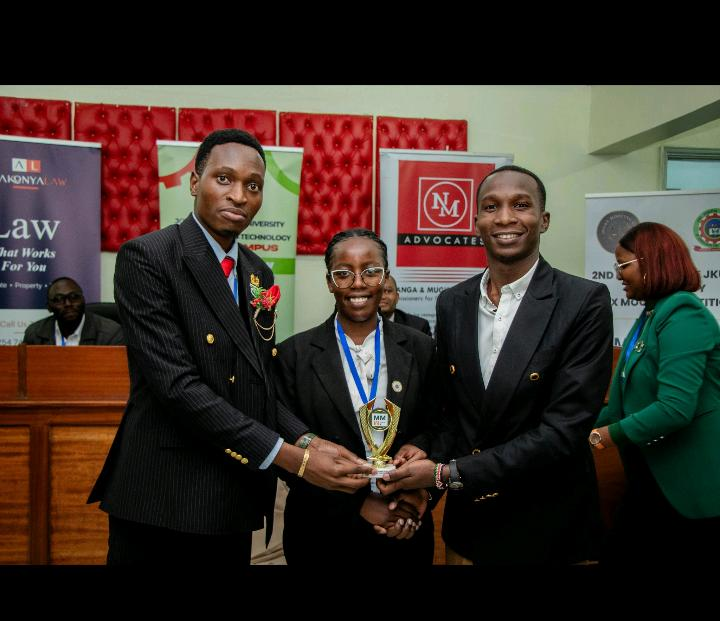 Winners of the 2nd Edition JKUAT Inter-varsity Tax Moot Competition holding the trophy
