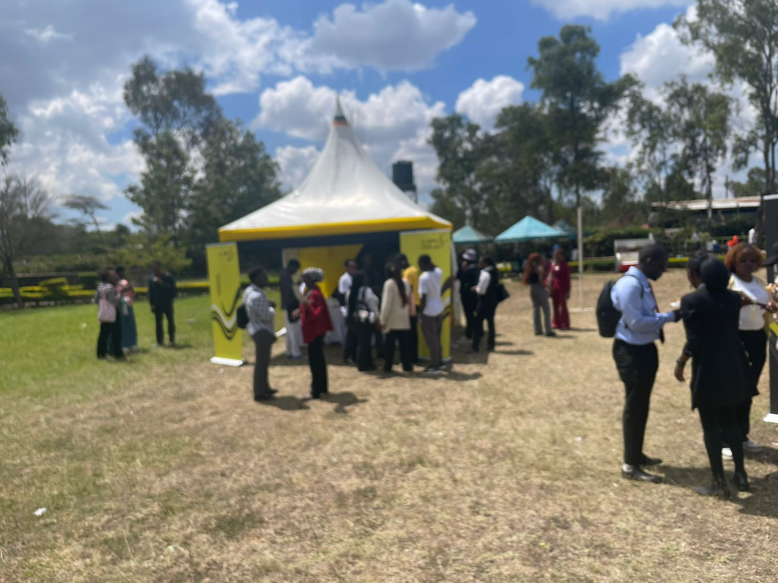 Wide view of attendees at the ENS Career Fair on the JKUAT Karen grounds